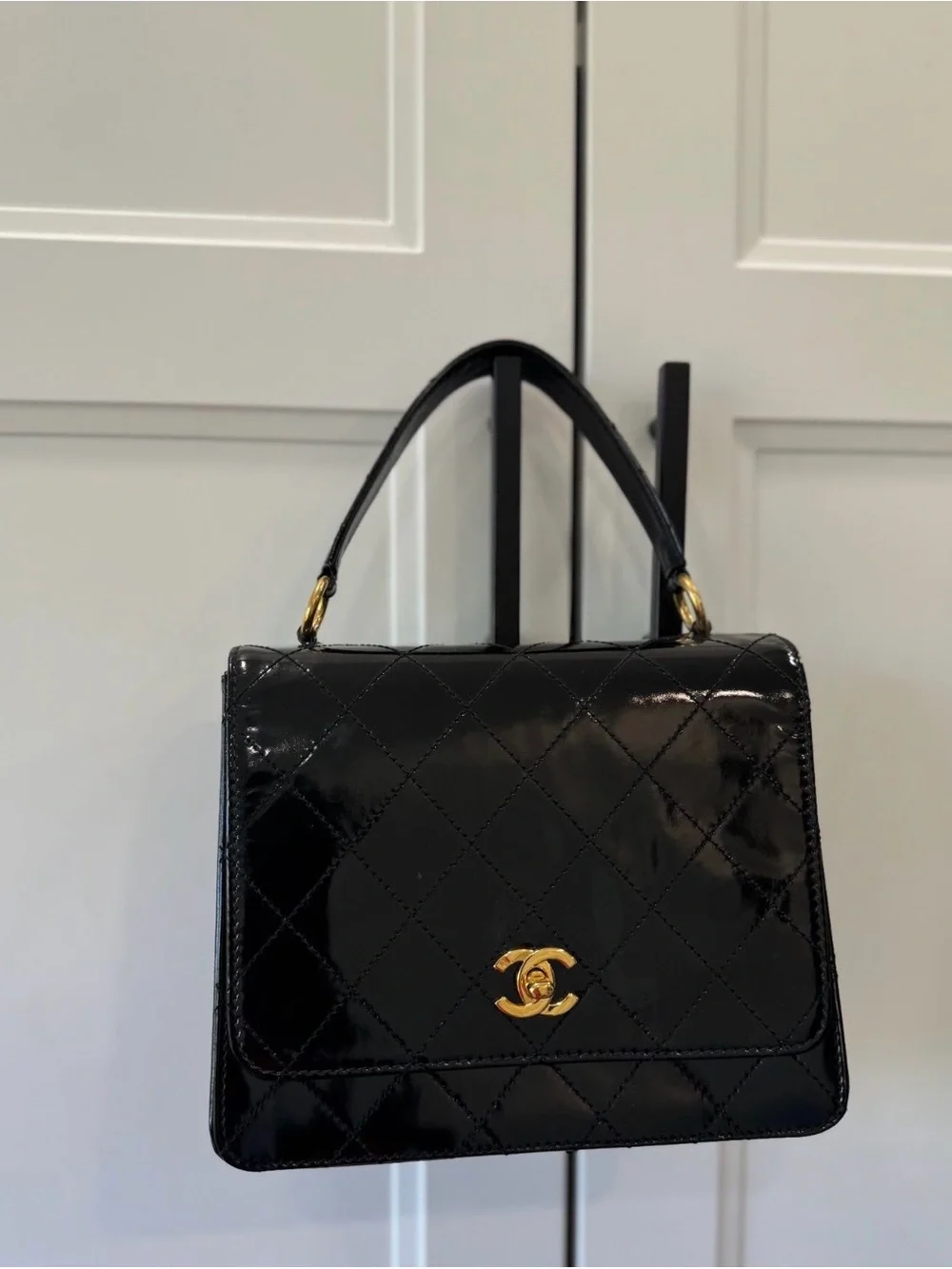 CHANEL Black Quilted Patent Leather Top Handle Satchel with Gold Hardware